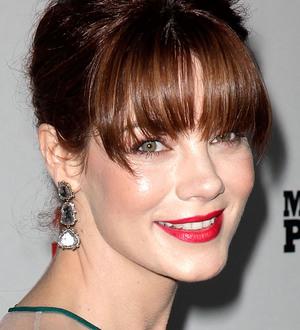 Michelle Monaghan wrestled hogs in high school