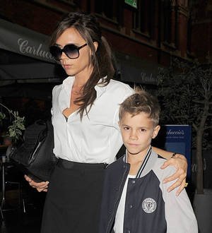 Romeo Beckham models for Burberry
