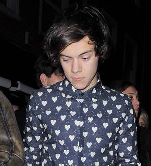 Harry Styles strips down for One Direction TV challenge