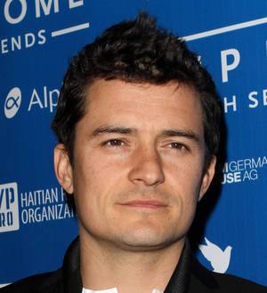 Orlando Bloom turns eco-warrior at climate change rally