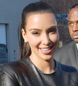 Kim Kardashian's curves split skin-tight dress