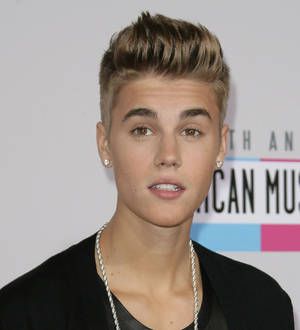 Justin Bieber releases free track for fans after crashing chat site