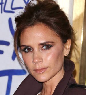 Victoria Beckham works hard to set example for kids
