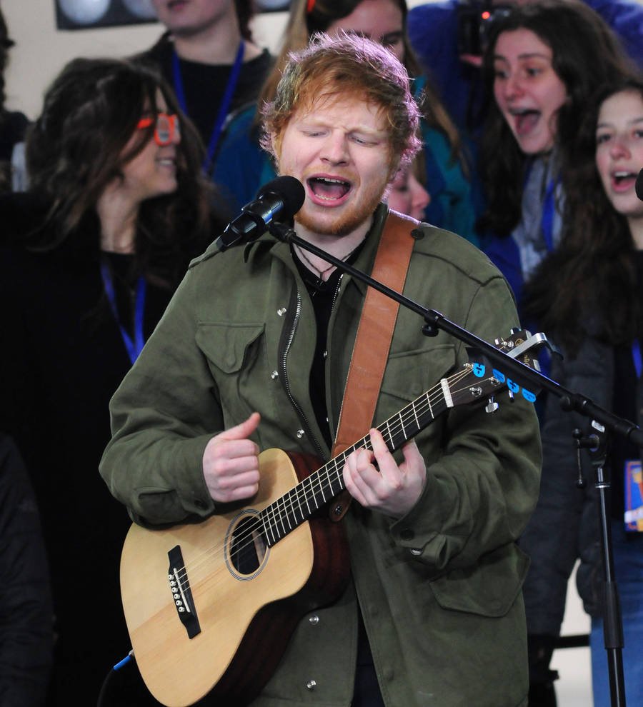 Ed Sheeran divides opinion over use of backing tracks at Glastonbury