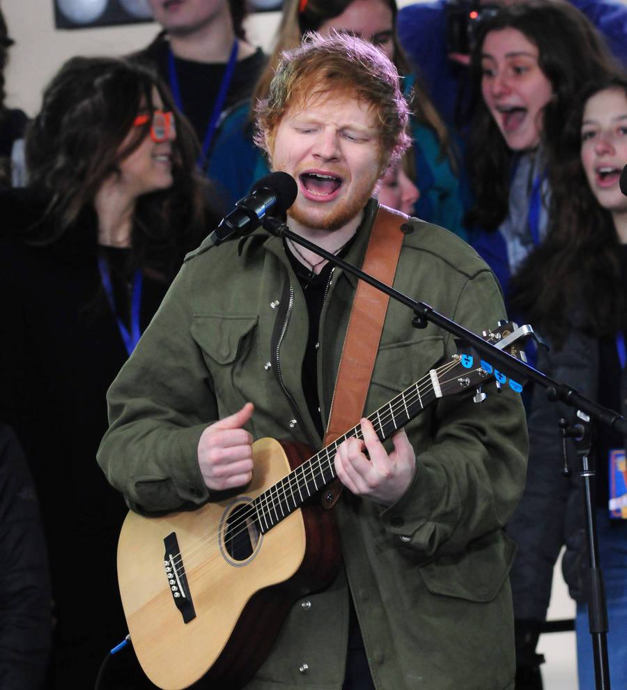 Ed Sheeran divides opinion over use of backing tracks at Glastonbury