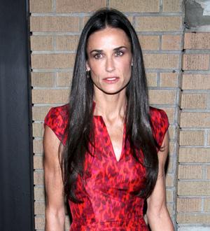 Demi Moore accused of hitting out at snapper