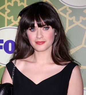Zooey Deschanel spit on by school classmates