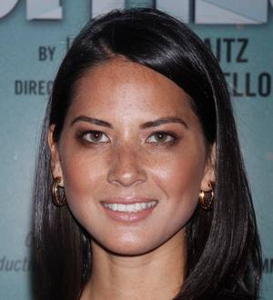 Olivia Munn celebrates after ailing elephant is saved