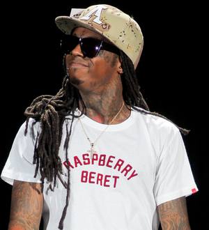 Lil Wayne still top as Beatles and Strait albums debut high
