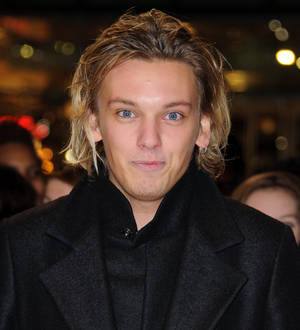 Jamie Campbell Bower celebrating campaign win