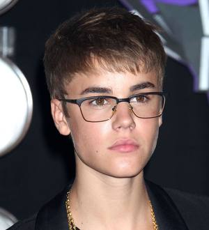 Justin Bieber and Usher team up to thrill voice teacher at Hall of Fame induction