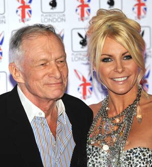 Hugh Hefner's wife auctioning off wedding dress
