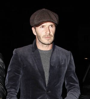 David Beckham braves blizzard chaos for wife's fashion show