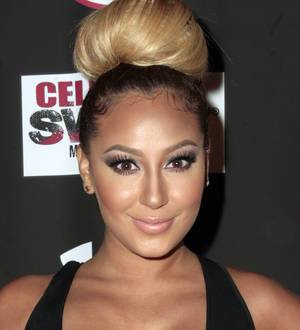 Adrienne Bailon made up fake boyfriend to get rid of Rob Kardashian