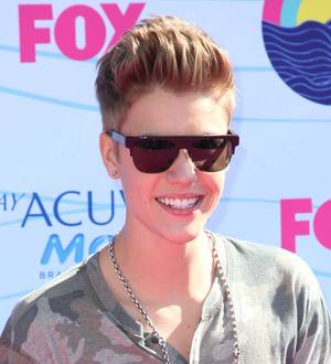 Justin Bieber freaked out by person hiding in his trash can