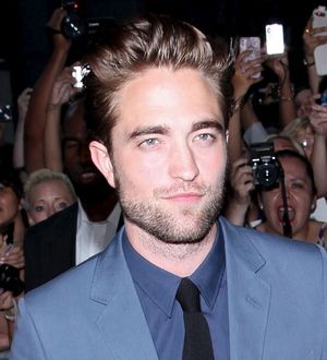 Robert Pattinson laughs off cheating scandal and drowns sorrows in ice cream on TV