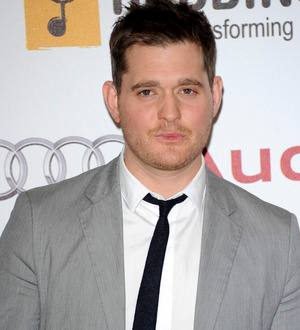 Michael Buble gets cold feet at ice hockey game