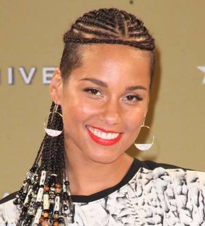 Pregnant Alicia Keys poses nude for charity drive