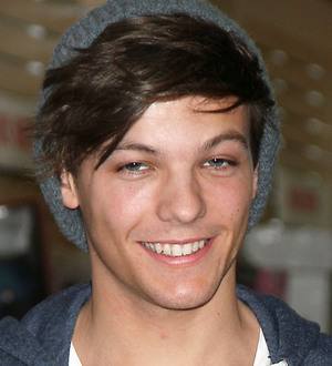 Louis Tomlinson plays down TV show rumour