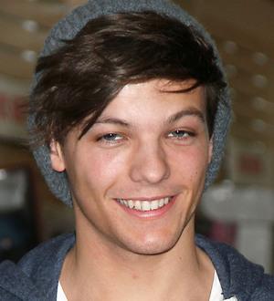 Louis Tomlinson plays down TV show rumour