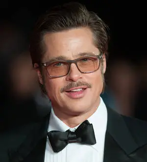 Brad Pitt roasts Rihanna at charity ball