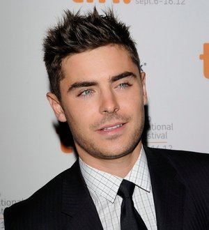 Zac Efron guzzles duck embryo snack