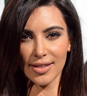 Kim Kardashian donates 100 pairs of designer shoes to charity