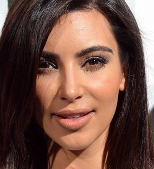 Kim Kardashian donates 100 pairs of designer shoes to charity