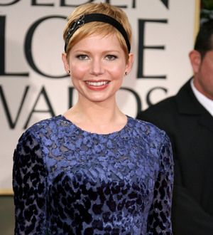 Michelle Williams in tears over relationship with father
