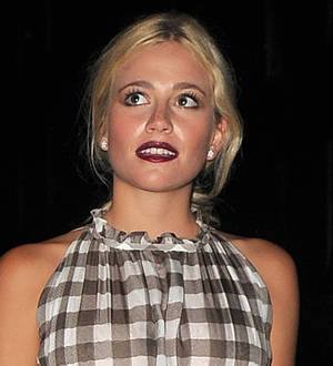 Pixie Lott gives outfits flash test at home