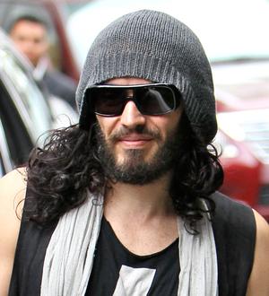 Russell Brand brushes off divorce woes