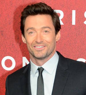 Hugh Jackman poses as stockbroker to impress wife