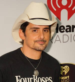 Brad Paisley postpones festival set due to poor weather