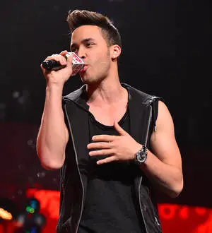 Prince Royce falls off stage during gig