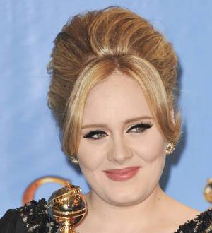 Adele's necklace sparks baby name gossip
