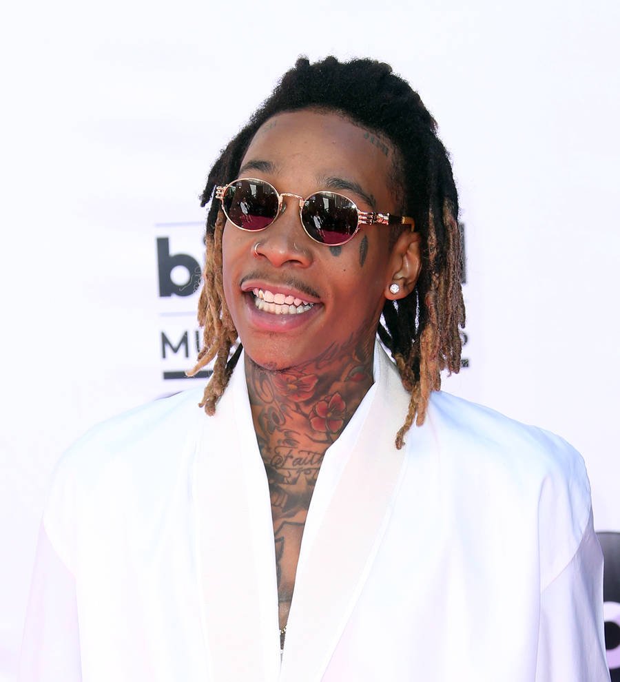 Wiz Khalifa is over dressing 'like a kid'
