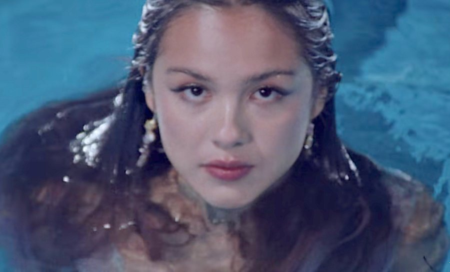 Olivia Rodrigo's New "Traitor" Music Video Calls Back To Her Previous Videos!