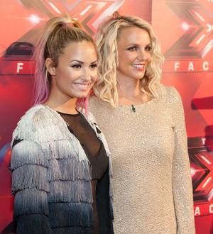 Britney Spears and Demi Lovato land Hollywood cement honor
