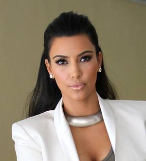 Kim Kardashian remembers dad at nuptials