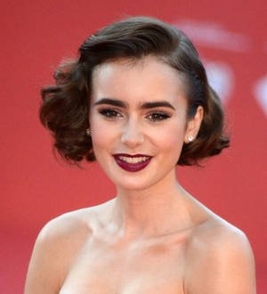 Lily Collins loves to dress up for renaissance fairs