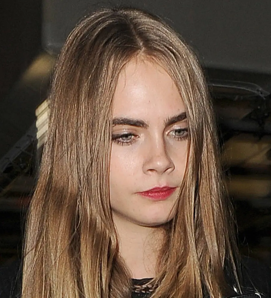 Cara Delevingne upset with photographer's upskirt snap efforts