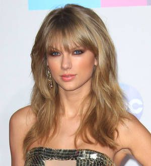 Taylor Swift strikes gold with quadruple win at American Music Awards