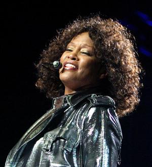 Whitney Houston's sister-in-law fights tears during emotional Oprah interview