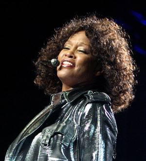 Whitney Houston's sister-in-law fights tears during emotional Oprah interview