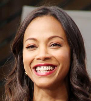 Zoe Saldana poses topless for magazine
