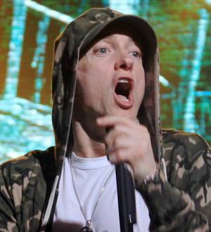 Eminem brings Dido onstage at Britain's Reading festival