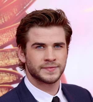 Liam Hemsworth hosts Hunger Games screening for charity