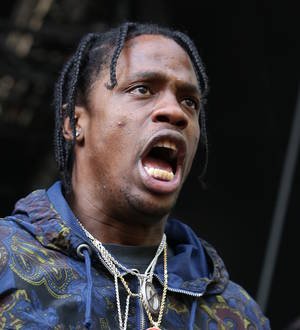 Travis Scott enraged by shoe-stealing concert goer