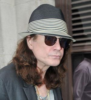 Osbournes celebrated wedding anniversary sick in bed