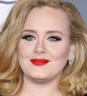 Adele tied winning records at the Grammys